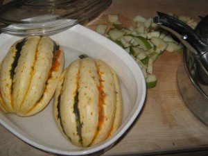 Squash halves face down in microwavable bowl 