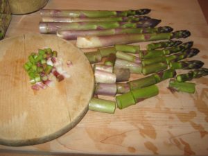 Chopped up green garlic and slices of asparagus