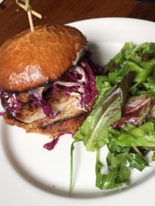 Fried chicken sandwich on brioche with cabbage slaw & garlic mayo