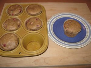 Flavorful & tangy cranberry pecan muffins out of the oven